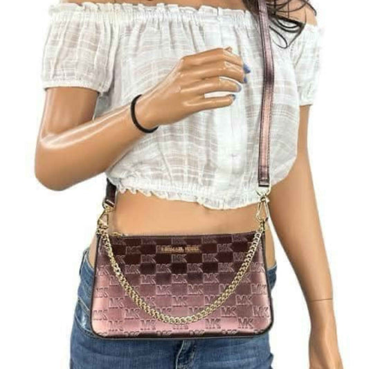 stunning micheal kor zip pouchette cross body 448$ - Bloom Shine
