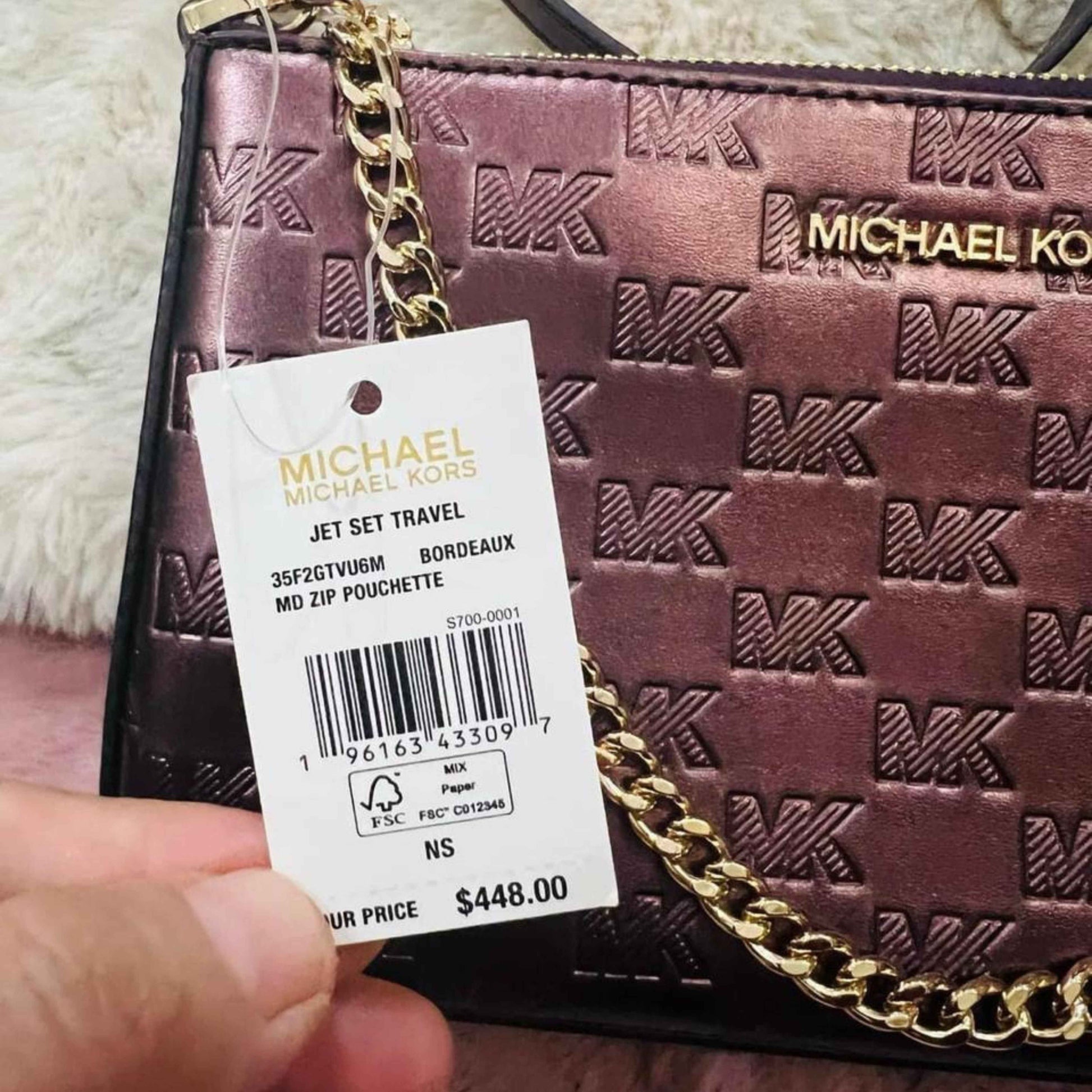 stunning micheal kor zip pouchette cross body 448$ - Bloom Shine